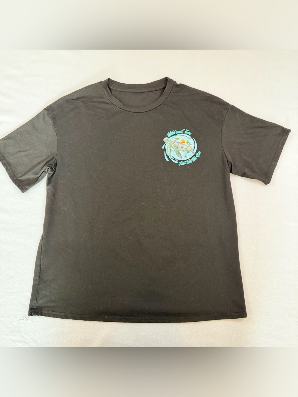 Black Short-Sleeve Women's Graphic Tee with Teal Accent